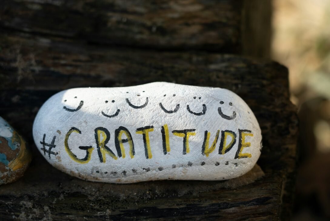 a white and yellow object with writing on it
