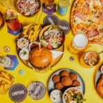 Food Mood Mapping: Tracking How Different Meals Affect Your Mental State a table topped with lots of food and drinks