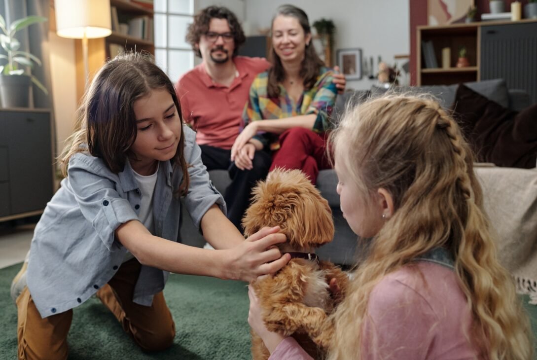 Family Gathering with Pet Dog in Living Room