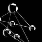 a black and white photo of a group of spheres