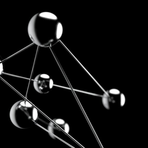 a black and white photo of a group of spheres