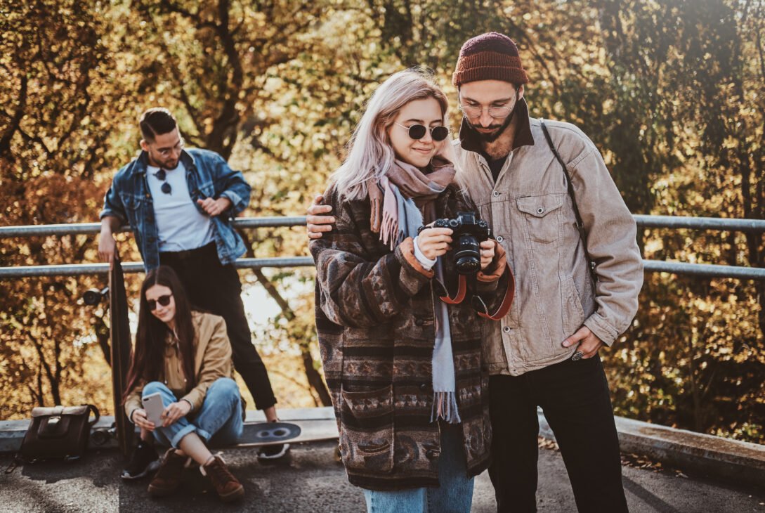People are watching photos on photo camera