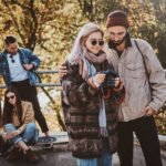 People are watching photos on photo camera