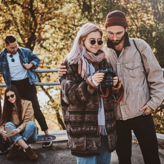 People are watching photos on photo camera