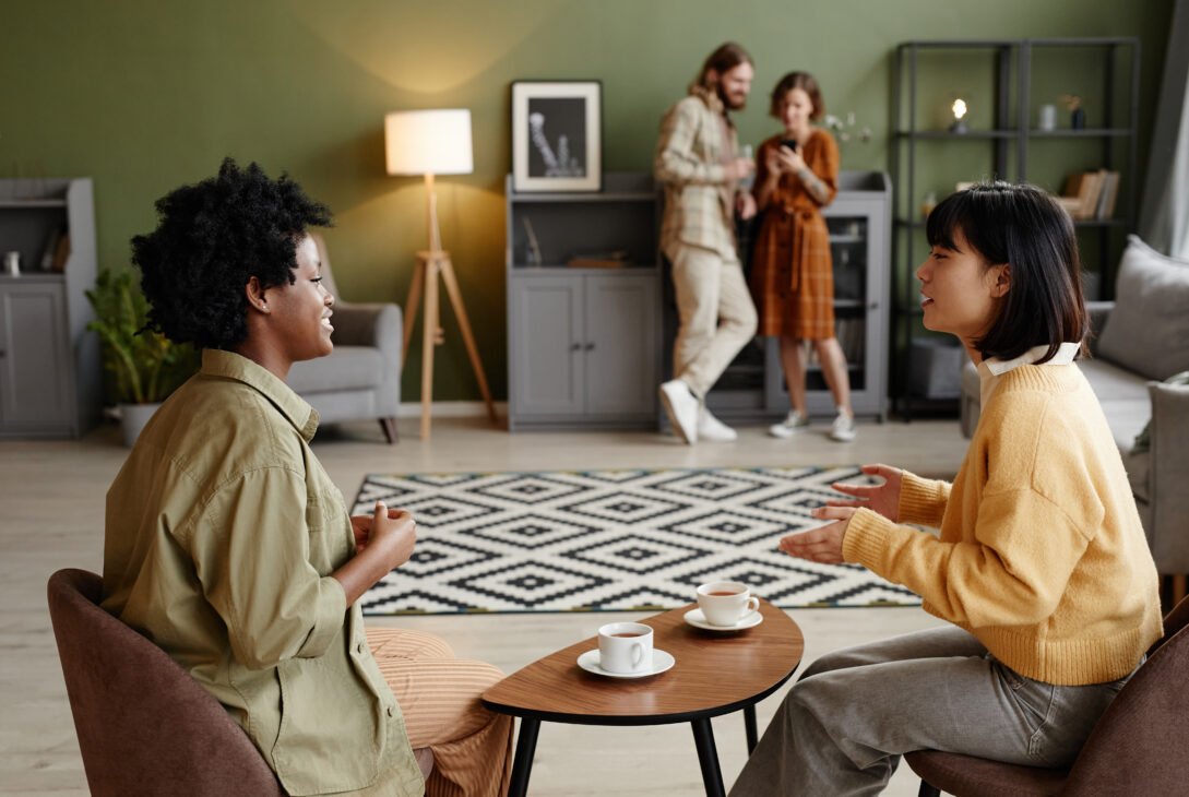 Women drinking coffee and talking